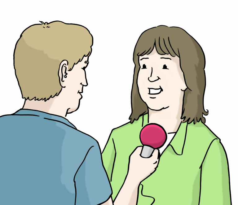 Eine Person befragt eine andere Person mit einem Mikro in der Hand.